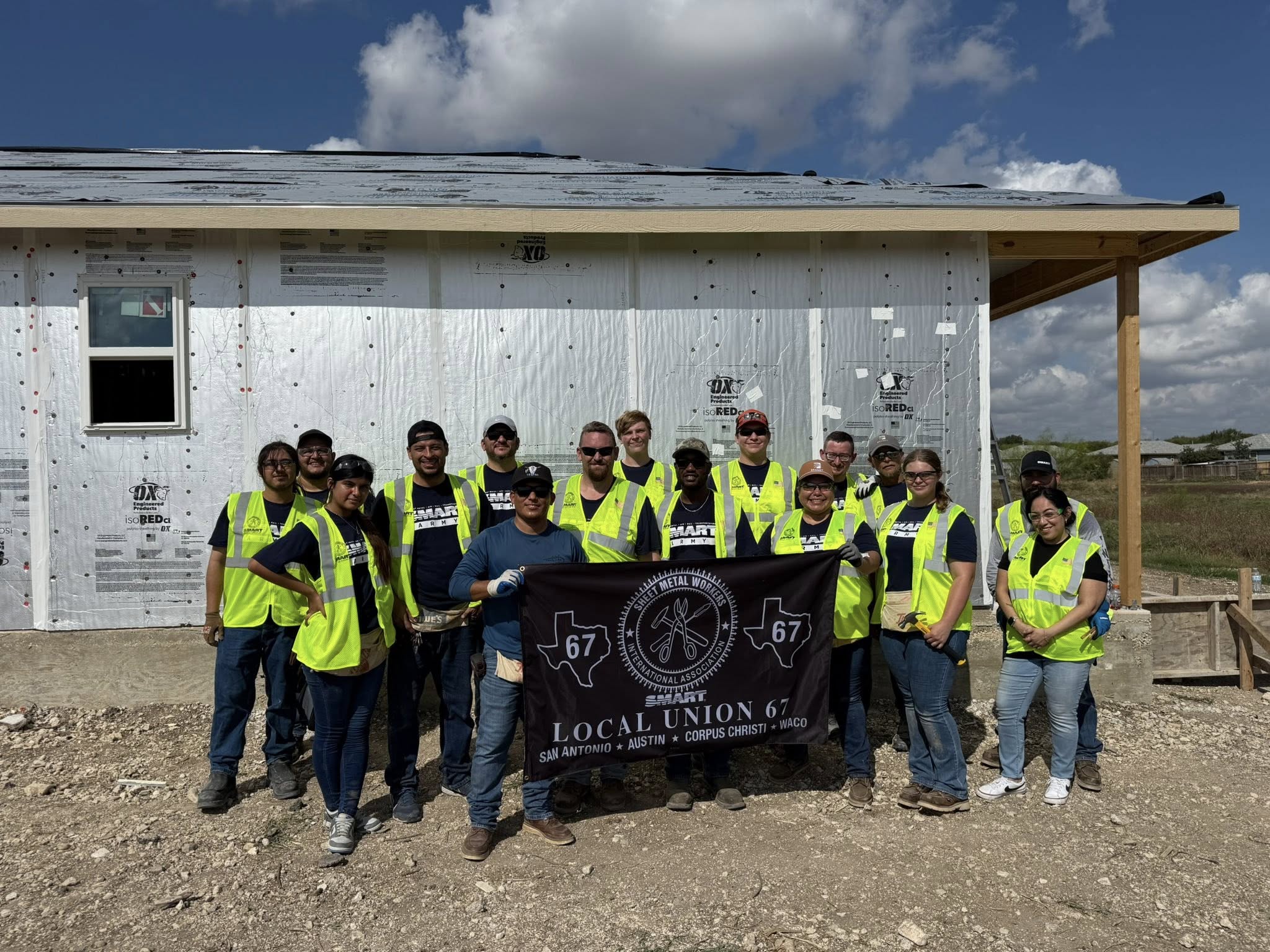 The brothers and sisters of SMART Local 67 (San Antonio) recently came together during their free time to volunteer with Habitat for Humanity.