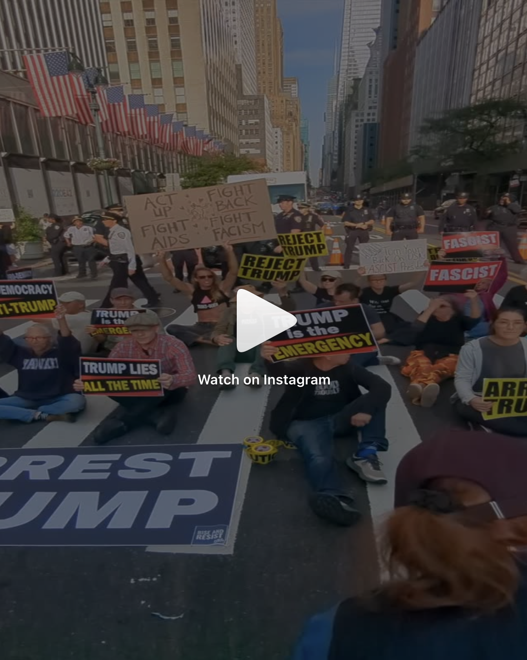 Another video from New York's action on Tuesday shows a crowd sitting in the street surrounded by New York City police