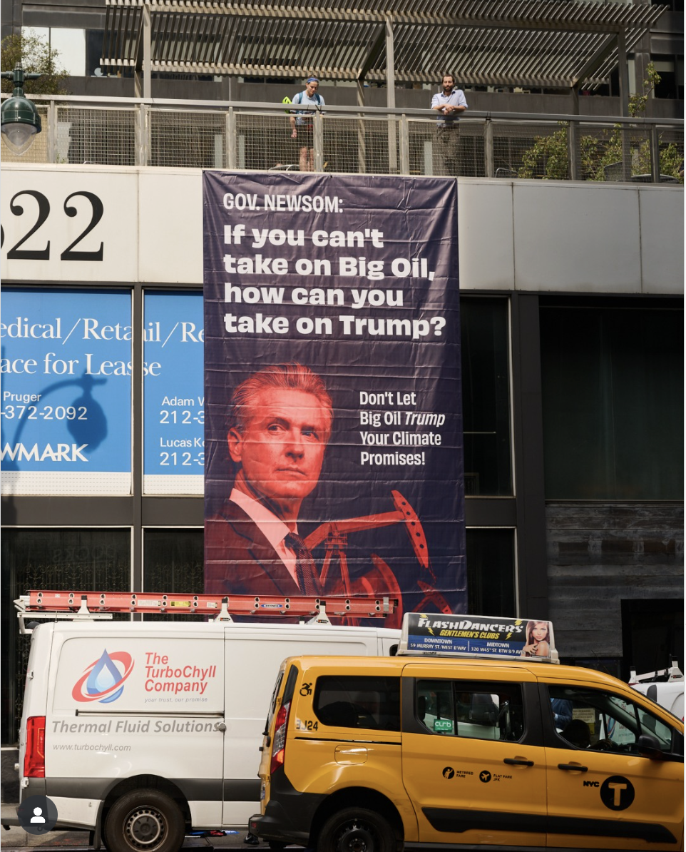 A picture from this morning's action shows a multi-story tall banner on 3rd Avenue in New York that says 