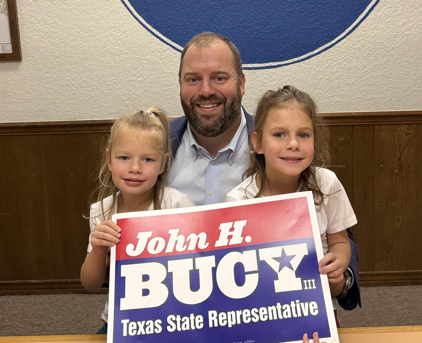 John with his daughters, Bradley and Parker