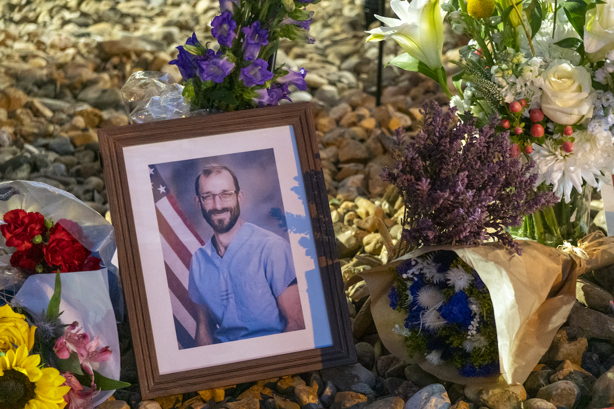 Framed photo of Alex Pretti at the Austin candlelit vigil.