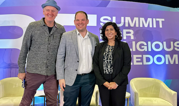 An image of Doug Pagitt on stage after speaking at the Summit for Religious Freedom.