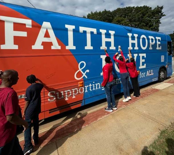 A photograph of the Vote Common Good bus on the road, ready for the next tour.