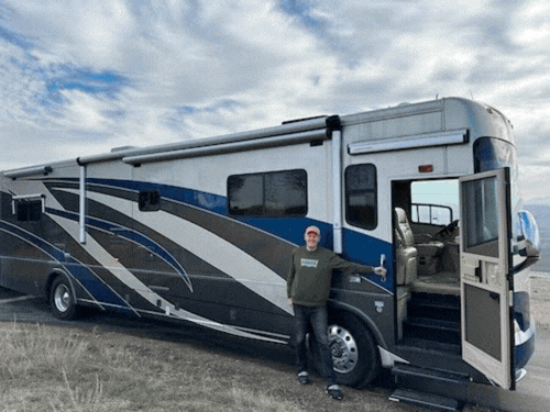A GIF showing the bus without a wrap, with Doug Pagitt standing alongside, and the double sides of the bus wrap.