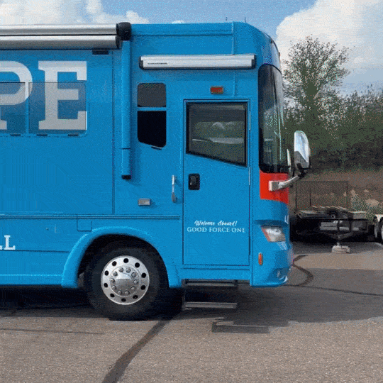 A GIF of the two sides of the Faith, Hope, & Love bus.