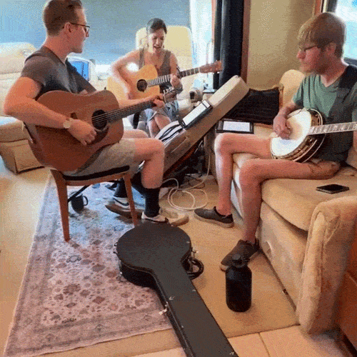 A GIF featuring the crew of Good Force One singing a song inside the bus.