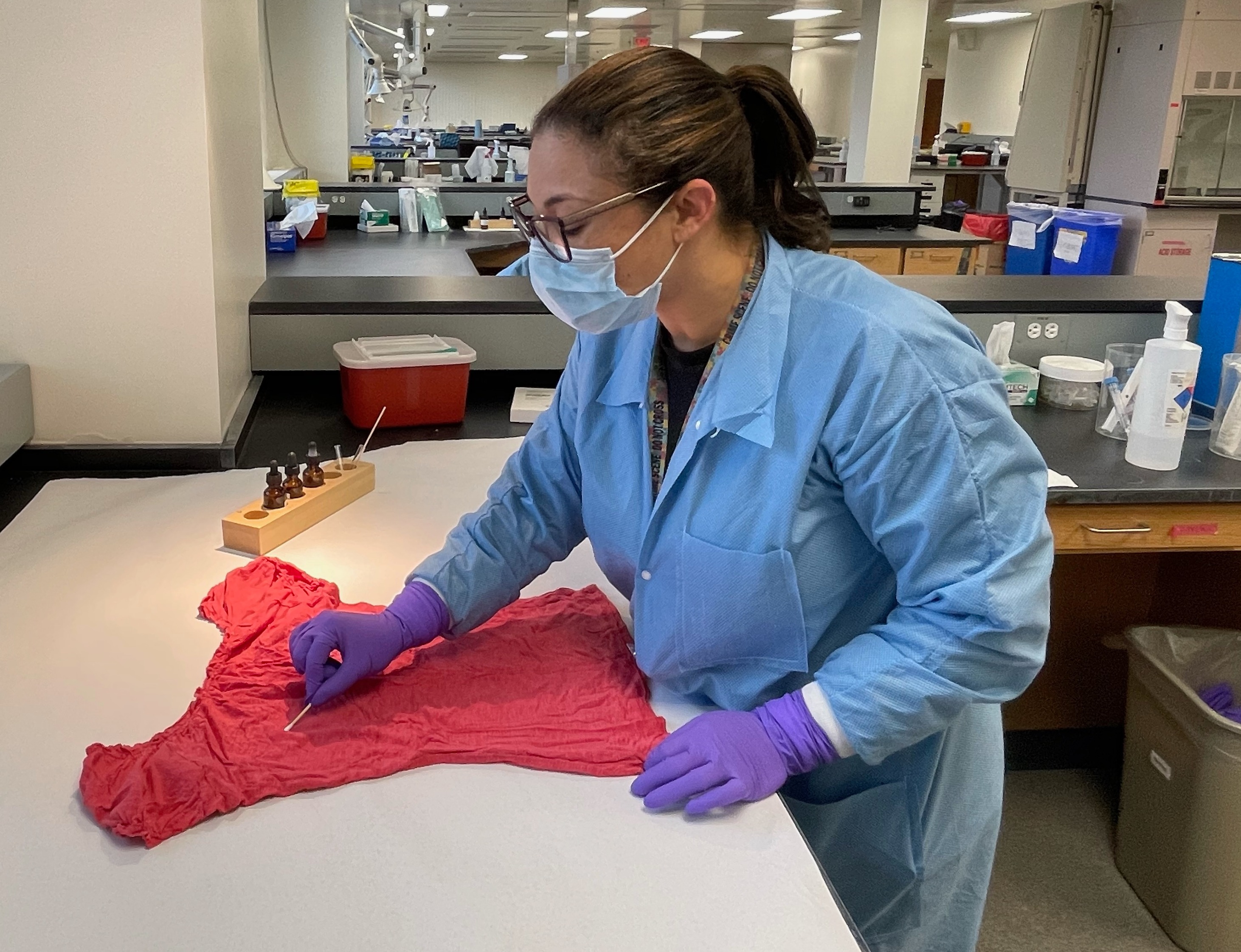 Forensic science professional examining evidence