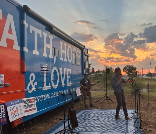 An image of the Faith, Hope, & Love bus at sunset.