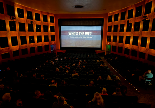 A photo of people watching the film Who's the We in Minneapolis.