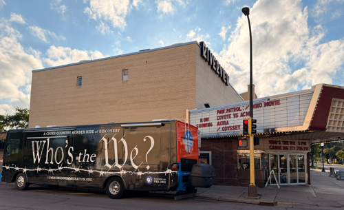 An image of the VCG bus parked outside of the Minneapolis Riverview theater.