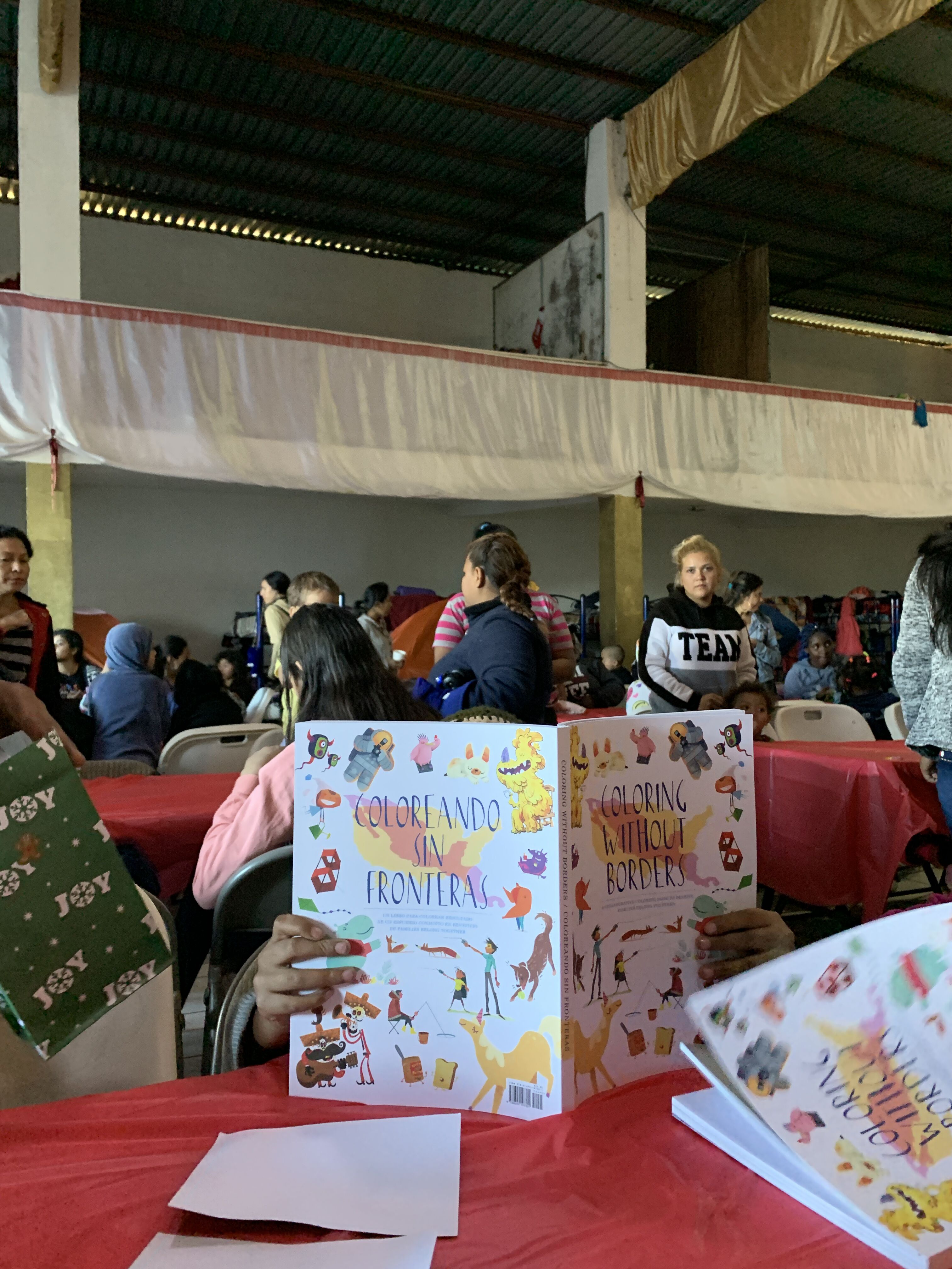 Child reading Coloring Without Borders