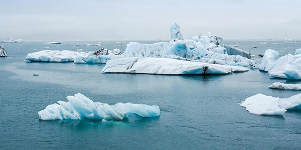 Rapidly melting sea ice in the Arctic.