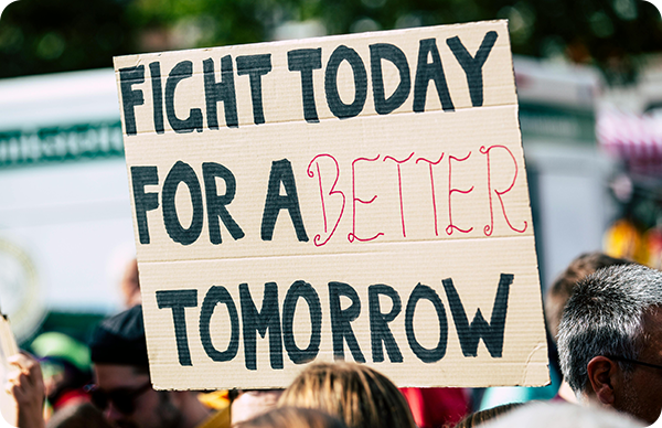 Image of a fight today for a better tomorrow sign