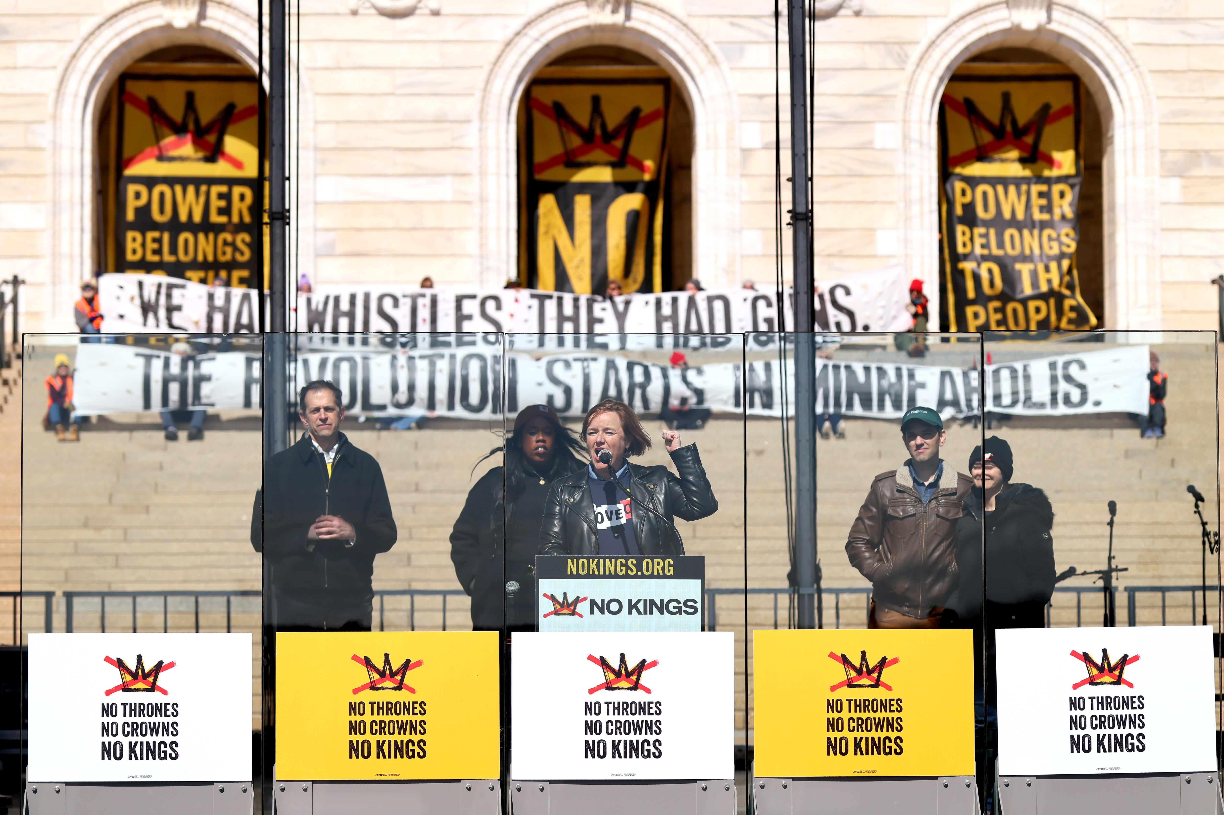 Katie Bethell, Executive Director of Move speaking on stage at No Kings 3. Click on image to go to recap video on youtube